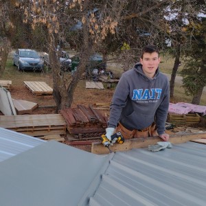Jonathan helping out with the roofing